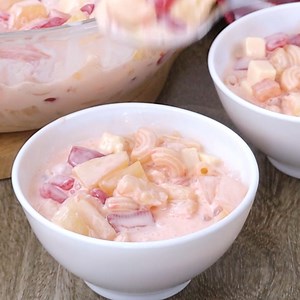 213K views · 3.2K reactions | Filipino-style Pasta Fruit Salad is a must for Christmas! Made with macaroni, fruit cocktail, kaong, nata de coco, cheese, and sweetened cream, it's the perfect holiday treat! Get the full recipe: https://www.kawalingpinoy.com/pasta-fruit-salad/ | Kawaling Pinoy Recipe Blog | Facebook