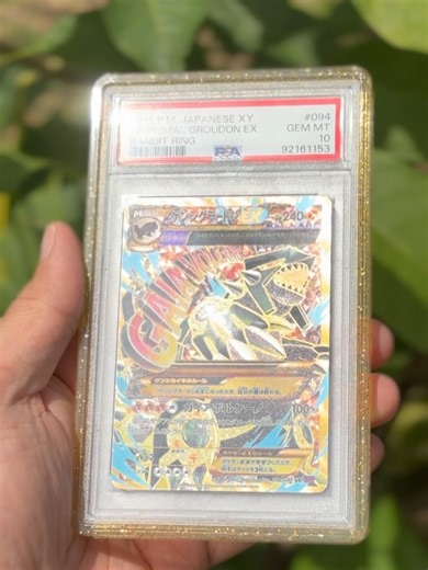 The Grail Dad on Instagram: "🌋GAIA VOLCANO🌋 PSA 10 Primal Groudon Ex from the Bandit Ring (2015) set. Population in the world as of today: 176 Paired with @gradedguard ‘s confetti. Super stoked to add this in my PC, big thanks and all love to @conceptgradingbynick for the great deal. Be sure to check them out ❤️ -The Grail Dad. #groudon #pokemonruby #pokemon #pokemoncollector #pokemoncard"