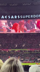The crowd booed Taylor Swift as they show her on the big screen. | And We Know