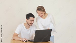 Confident couple, paying taxes, reading a letter paper from the Bank at home, financial matters, internal accounts