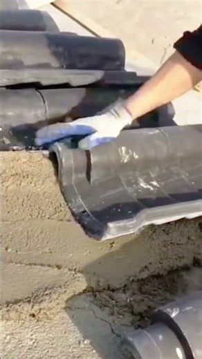 Precise Mortar Application Technique for Secure Roof Tile Installation