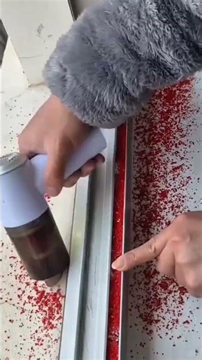 the process of cleaning iron windows using a special manual machine