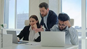 Angry team leader director shouting dissatisfied boss arguing at office meeting annoyed businessman swear employees for mistake wrong failed project on laptop business problem conflict scold workers