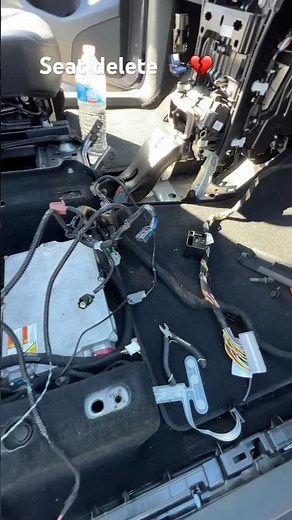 Removing the passenger seat from a Tesla Model Y