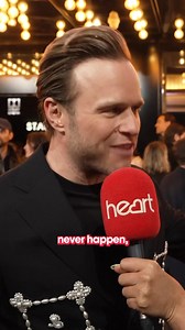 9K views · 181 reactions | Olly Murs and Robbie Williams both spoke to @Heart at the London premiere of #BetterManMovie. Rob’s impression of Gary Barlow when asked what his thoughts were of himself in the movie is comedy gold, so funny! Team RWFanfest ❤ #robbiewilliams #movietalk #funmoment | Robbie Williams Fanfest | Facebook