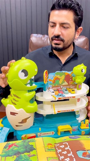 𝗗𝗜𝗬 𝗠𝗮𝗻𝘂𝗮𝗹 𝗗𝗶𝗻𝗼𝘀𝗮𝘂𝗿 𝗣𝗮𝗿𝗸𝗶𝗻𝗴 𝗟𝗼𝘁 𝗪𝗶𝘁𝗵 𝗟𝗶𝗴𝗵𝘁𝘀 Assemble your own dino-themed parking world filled with excitement, glowing lights, and Jurassic fun! 𝗦𝗵𝗼𝗽 𝗡𝗼𝘄: https://www.toycompany.pk/diy-manual-dinosaur-parking-lot-with-lights . . . . #DinoParkingLot #DIYFun #DinosaurToys #LightsAndAdventure #JurassicPlayTime #giftforkids | Toy Company