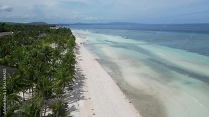 Drone flies over white sandy beaches of Philippine islands of Bohol. Relax in tropics by the sea on the paradise island of Bohol. Cinematic drone footage of the beaches of the resort island of Bohol Stock Video
