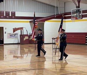 Paris Police Department Honor Guard Members (Captain Doug Thompson and Sergeant David Whitaker) Post Colors for the Trinity Christian School’s Pre- Veterans Day Assembly. | Paris Police Department - Texas USA