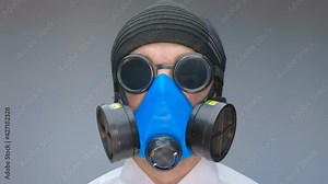 On a light background, a man in a blue gas mask, protective black goggles, hat and a white shirt as a symbol of the year of the coronavirus pandemic. Let this be a joke! Closeup