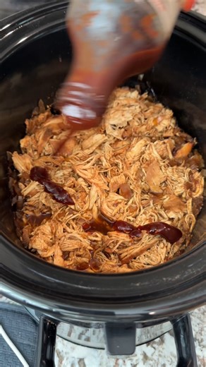 Set it and forget it, this Slow Cooker BBQ Chicken makes dinner easy! Comment "SEND RECIPE" to grab this slow cooker BBQ chicken! | The Clean Eating Couple