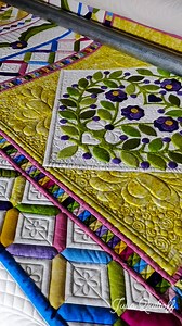 Enjoying the view! A Magical feeling of hours of work being revealed... The quilt needs a good rest of course, to fluff back up after being tightly rolled on the bar. | Julia Quiltoff