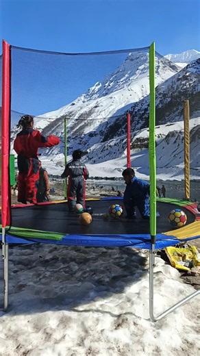 Trampoline activity for kids in Sissu #placestovisit #kidsenjoying #jumping #snow #mountains #shorts
