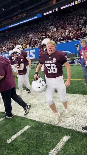 Menominee celebrates after a 34-6 win to clinch MHSAA Division 7 football state championship