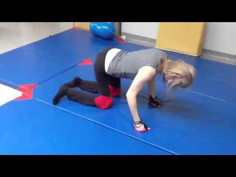 Woman Crawling On Her Own After Spinal Cord Injury