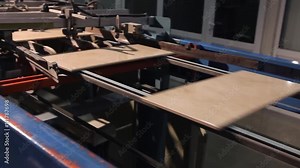 Sorting and packaging of ceramic tiles on a fully automated packaging line. Production of ceramic tiles. Ceramic tile factory. Making ceramic tile.