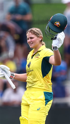 What a moment! Queenslander Georgia Voll brings up her hundred in her second game for Australia at Allan Border Field! #PlayoftheDay #AUSvIND | HCLTech | cricket.com.au