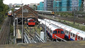 #1050172 Queens Park, 5 October 2019. A Bakerloo Line service from Elephant & Castle arrives as a southbound service departs. Another pair of trains complete the same scene as an Overground service heads for Euston and a pair of class 350s head north on the WCML. | Boogies Trains