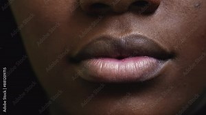 Macro Close-Up of a Black Girl's Mouth and Lips. African descent person anatomy facial body part