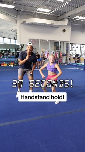 Asking Cheerleades How Long They Can Hold A Handstand! #cheer #handstand