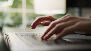 Download Hand typing on a Computer Keyboard for free