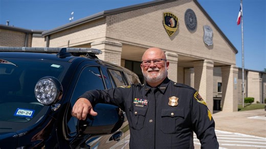 Officer presents $23,900 check to 84-year-old woman after saving her from a Bitcoin fraud scheme in North Texas