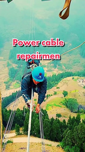 Power cable repairman in the air. #china #chinaconstruction #chinainfrastructure #powertransmission #madeinchina #repairman