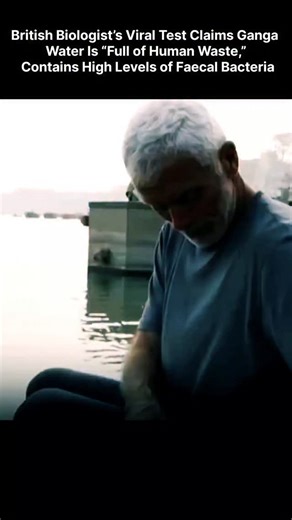 news with me0 on Instagram: "A viral video shared on Instagram by British biologist and television presenter Jeremy Wade shows him conducting a simple water-quality test on the river Ganga, claiming the sample turned a light brown colour indicating the presence of faecal coliform bacteria — which he described as evidence the water is “full of human waste,” sparking widespread discussion and strong reactions on social media about pollution and public health concerns in the sacred river. Source: H