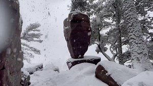 DEVIL'S LAKE SNOW: Less than ideal hiking conditions at Devil's Lake State Park in Baraboo. The Balanced Rock landmark and trails were covered in snow Friday. fox6now.com/weather (Credit: Skillet Creek Media via Storyful) | FOX6 News Milwaukee