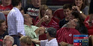 This Reds fan didn't even have to get out of his seat to make the catch