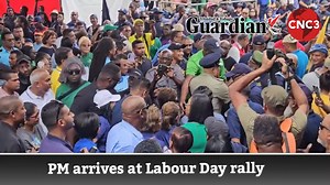 Prime Minister Kamla Persad-Bissessar, Labour Minister Leroy Baptiste and Finance Minister Davendranath Tancoo make their way into Charlie King Junction, Fyzabad, for the Joint Trade Union Movement's annual Labour Day rally. Video by Kevon Felmine and Ivan Toolsie. | CNC3 Television, Trinidad and Tobago