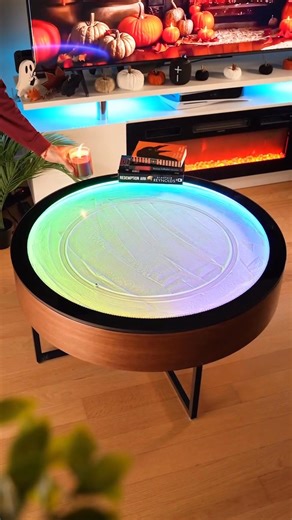 Watch magic unfold in your living room! This interactive coffee table features a silent ball gliding across sand to create endless hypnotic patterns, paired with hundreds of smartphone-controlled light effects. More than furniture—it’s a living work of art. 🎨📱 🌀 Dynamic sand art - Self-drawing patterns 💡 App-controlled lights - 100 color & motion effects 🤫 Silent glide technology - Smooth, meditative movement 🛋️ Modern centerpiece - Elevates any space Transform your home into an interactiv