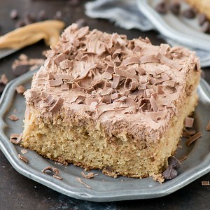 From scratch moist and peanut buttery PEANUT BUTTER SHEET CAKE! Pair this cake with chocolate frosting! http://thefirstyearblog.com/peanut-butter-sheet-cake/ | The First Year