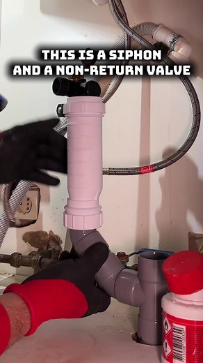 Ingenious Plumber Solves Overflow Problem in Sink Cabinet
