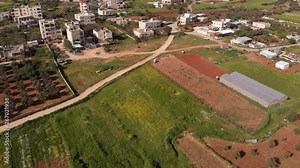 Israel Security wall aerial View Aerial footage of the Israeli Palestine wall close to Givon and bir nabala town