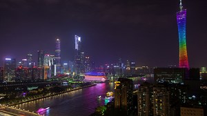 Multicolored canton tower in the night skyline - Free Stock Video