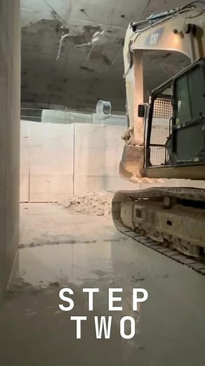 QUARRY LIFE STEP One: Before tipping any wall, we first create a landing bed using leftover material that didn’t meet production standards — giving it new purpose. STEP TWO: With the landing bed ready, the operator positions the machine precisely to pull the marble block over safely and efficiently. Follow along as we take you deeper into the process, step by step. #VermontQuarries #QuarryLife #DanbyMarble #AmericanMarble #NaturalStone #StoneQuarry #MarbleBlocks | Vermont Quarries