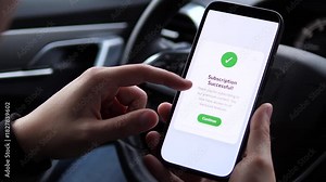A user receives instant confirmation of his premium subscription upgrade while in his vehicle. This scene demonstrates the ease of accessing exclusive content through mobile subscriptions, ideal for