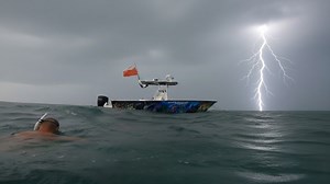 He said we were safe in the water... then lightning cracked
