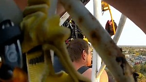 1.6K views | Bodycam footage shows officers climbing a radio tower to rescue a man stuck 250 feet in the air. | Democrat and Chronicle | Facebook