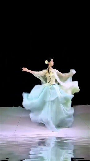 Experience the Timeless Elegance of Traditional Chinese Dance Costumes: Yu's Spring Journe