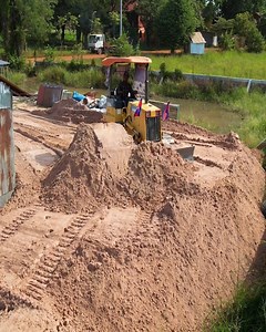 93K views · 1.3K reactions | Restoring Stability! Bulldozer Pushes Sand to Clear Landslides by House Fence! . . #Dozer #Bulldozer #heavyequipment #construction #Shantui #Komatsu #Dumptruck #Excavator #constructionsite #heavyduty #earthmoving #caterpillar | Bulldozer City | Facebook