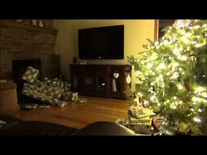This Video of (Invisible) Santa Caught On Camera Delivering Presents Through the Chimney Went Viral