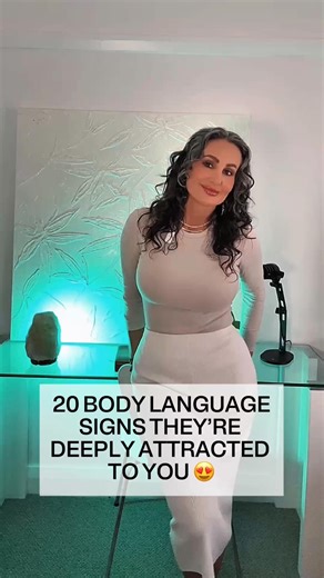 20 Body Language Signs They’re Deeply Attracted to You 😍😍 1. They hold eye contact a fraction too long. 2. Their pupils widen instantly when you enter the room. Attraction activates the sympathetic system before the mind can censor it. 3. They unconsciously angle their body toward you. 4. They mirror your movements without realizing. 5. Their voice softens or deepens when they speak to you. Vocal modulation is an instinctive way of signalling interest and safety. 6. Their breathing changes aro