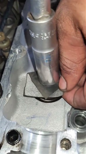 Valve lock plate installation.