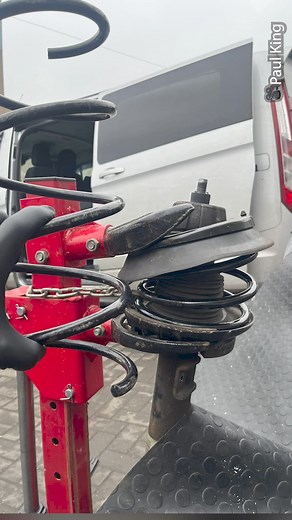 Who designed this awesome coil spring compressor? | CarHax