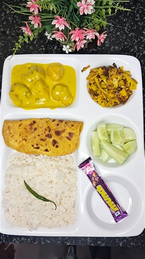 Traditional Indian Thali | Kadhi Pakoda, Rice, Paratha, Aloo Bhujia & Fresh Salad