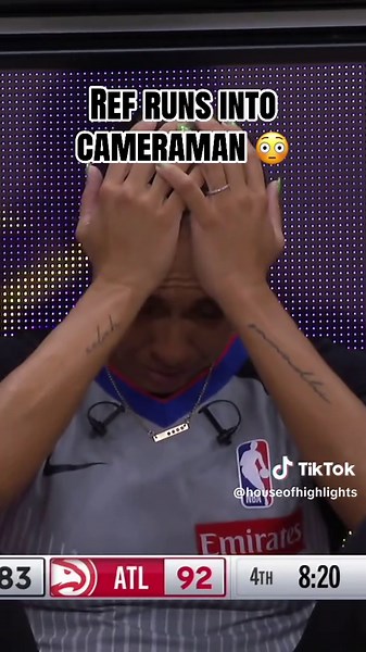 Referee Collides with Cameraman During Game