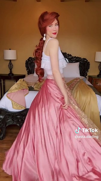 Replying to @Summer Summers After one month she is finally finished! FINALLY FINISHED my Anastasia Coronation gown! I used a combination of the animated version vs extant museum examples of court gowns to create this costume. I was aiming for a historically inspired version rooted in fantasy. I was SO EXCITED to find this Christmas ribbon in December at Walymart and cut it up to use for the bodice so it would match the trim. I was going to embroider the bodice but decided to work smarter not har