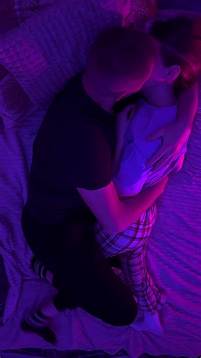 Intimate Moments: A Romantic Bedside Embrace