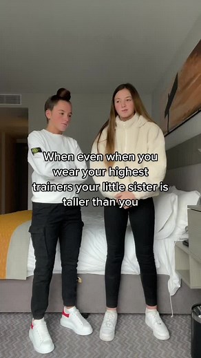Height Difference Humor: Sister Taller in Sneakers